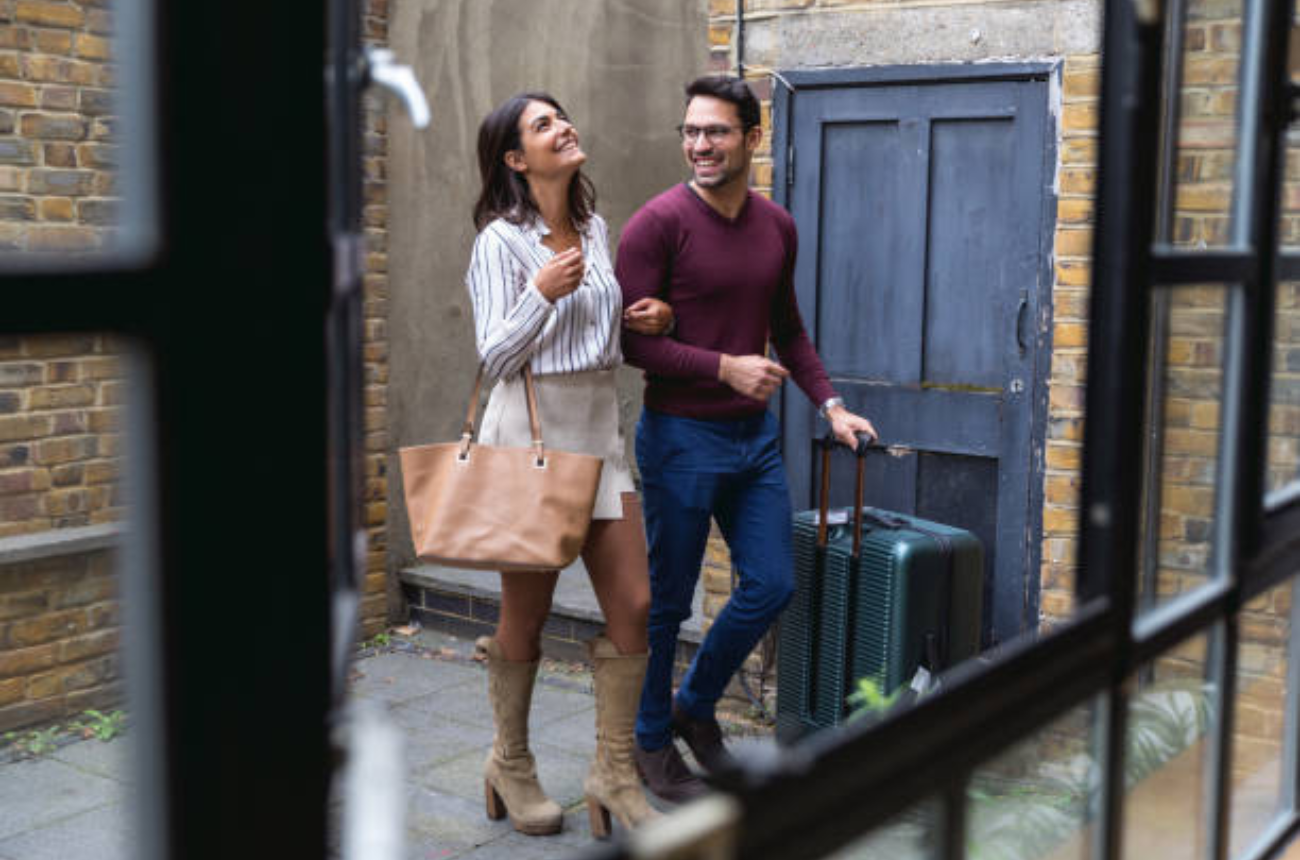 Couple arriving in the UK after successful spouse visa application